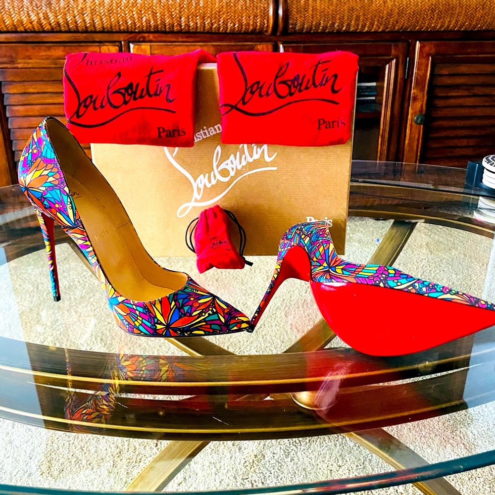 Christian Louboutin heels with a pointed toe. Size run small fits like a 7.5. - Picture 2 of 3